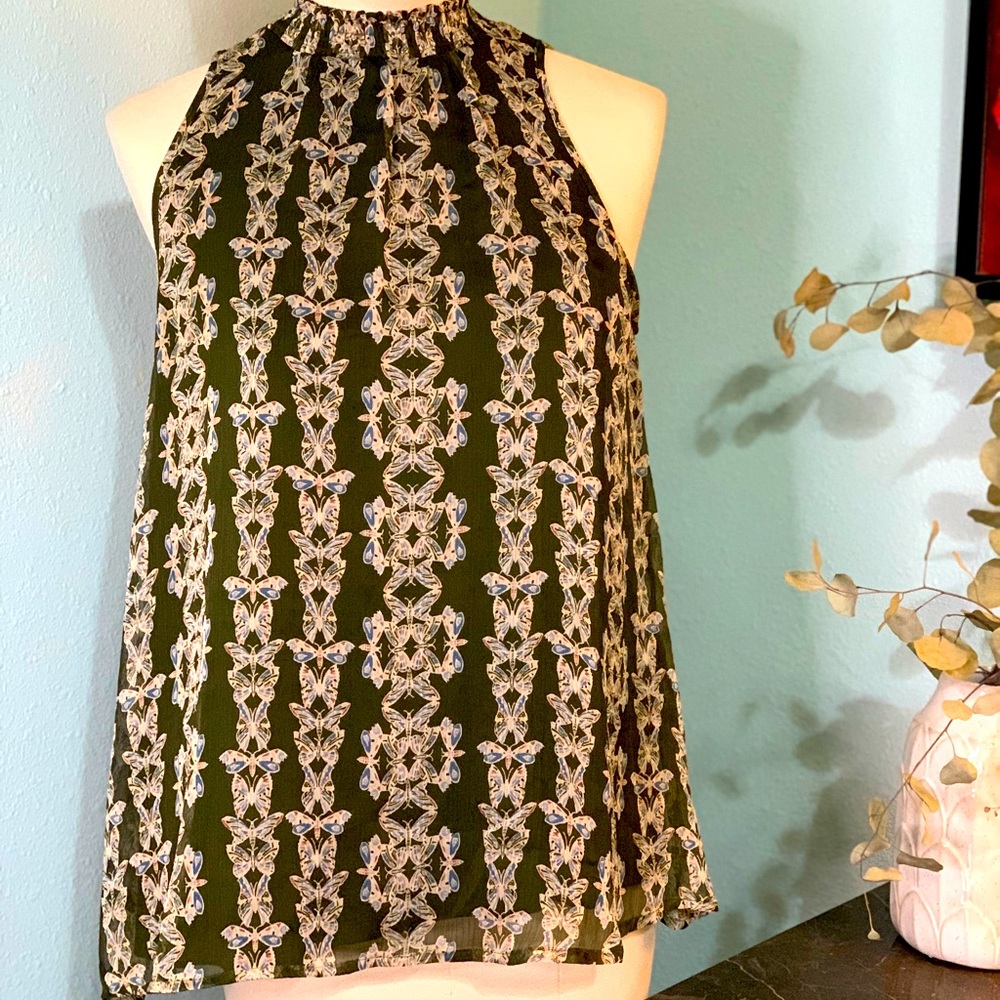 Dark green sleeveless high neck top